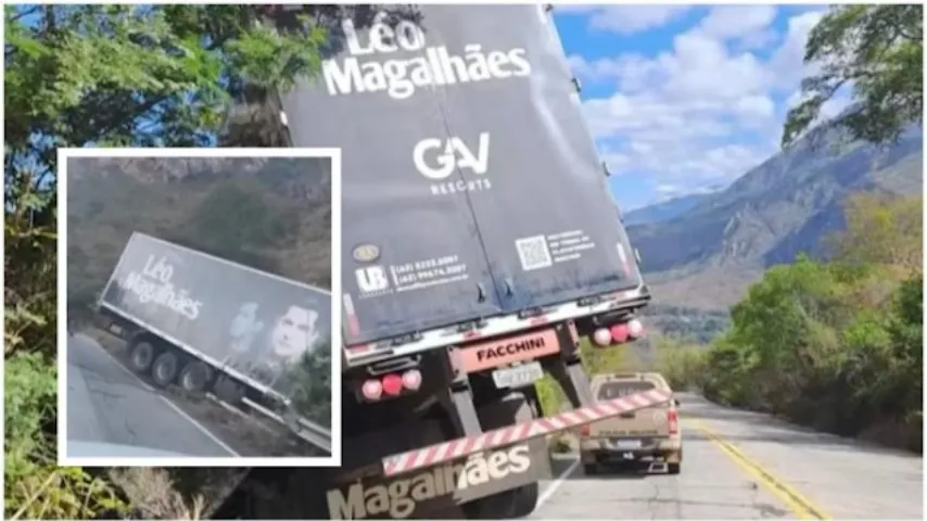 Carreta que transportava equipamentos do cantor Léo Magalhães fica pendurada em ribanceira